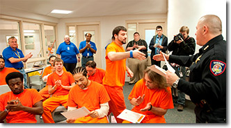 prays with prisoners